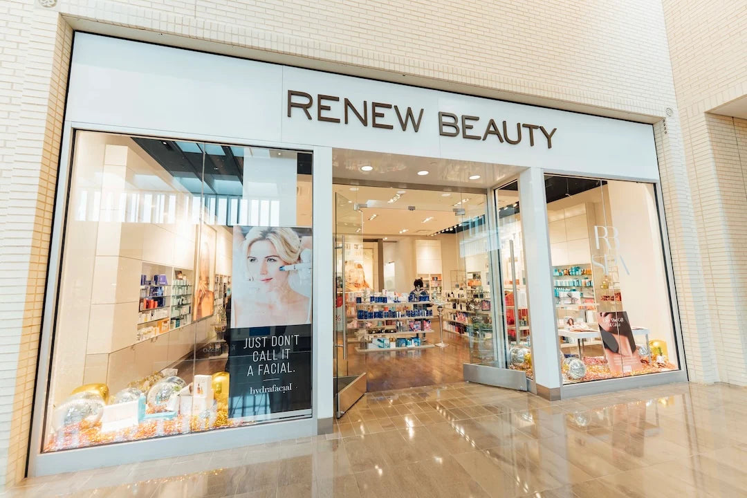 Renew Beauty store front with large windows displaying products and a sign.